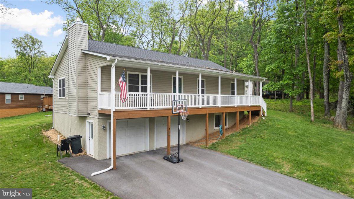 106 Split Rail Road Front Royal, VA 22630 - Photo 26 of 35 a house view with a garden space