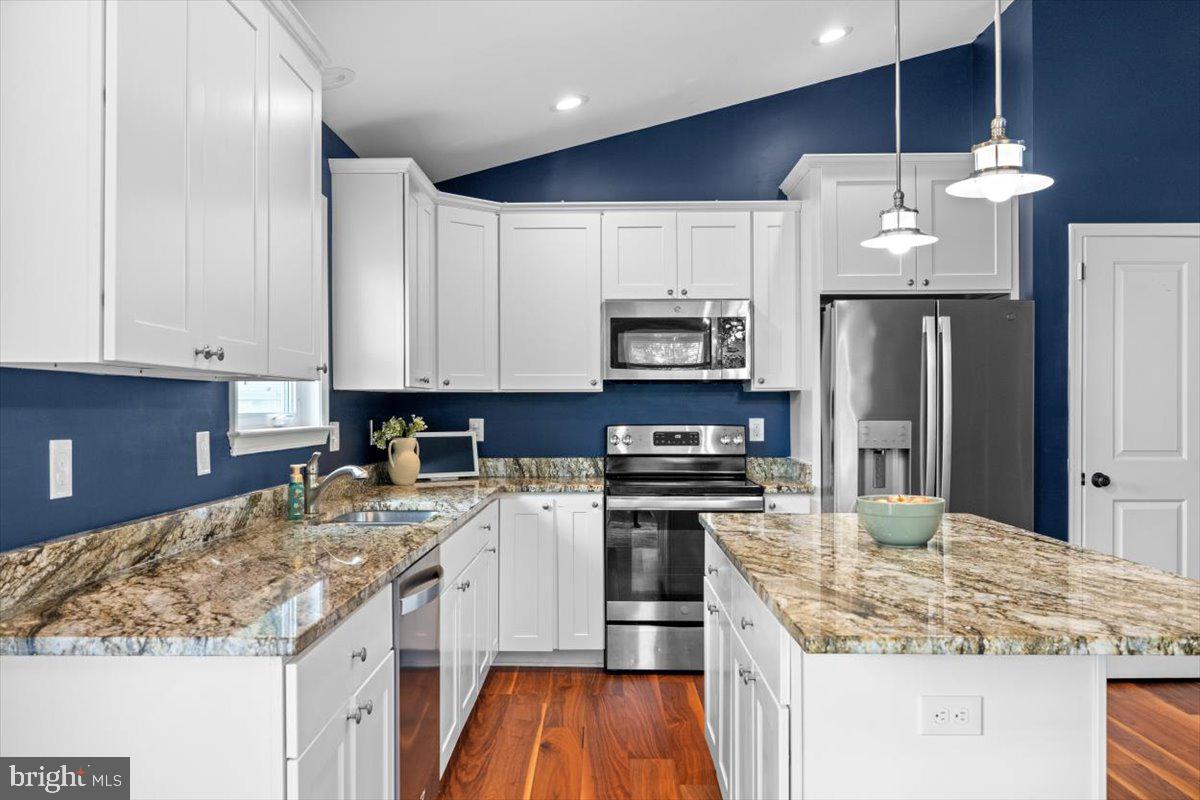 106 Split Rail Road Front Royal, VA 22630 - Photo 7 of 35 a kitchen with stainless steel appliances granite countertop a sink stove and refrigerator