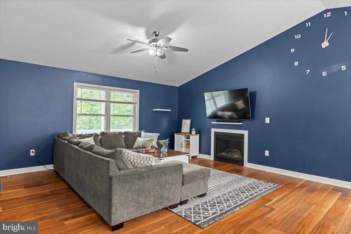 106 Split Rail Road Front Royal, VA 22630 - Photo 10 of 35 a living room with furniture and a fireplace