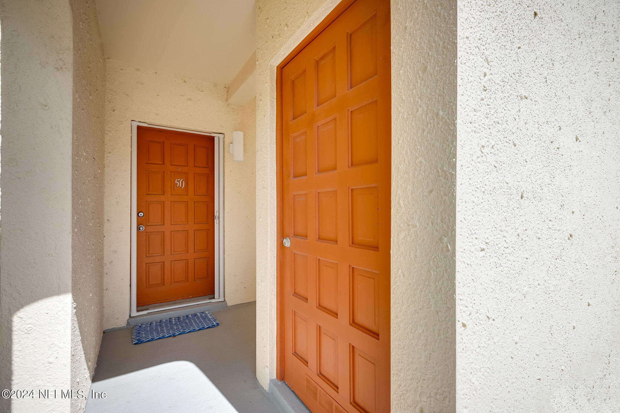390 A1A Beach Boulevard, Unit 50 St. Augustine, FL 32080 - Photo 14 of 20 a bathroom with a toilet and a shower