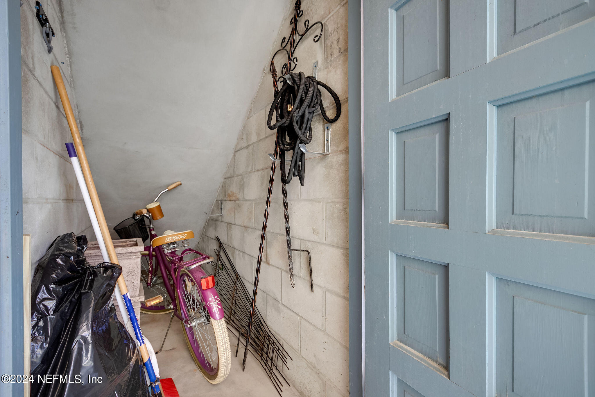 390 A1A Beach Boulevard, Unit 50 St. Augustine, FL 32080 - Photo 15 of 20 a view of a closet with storage