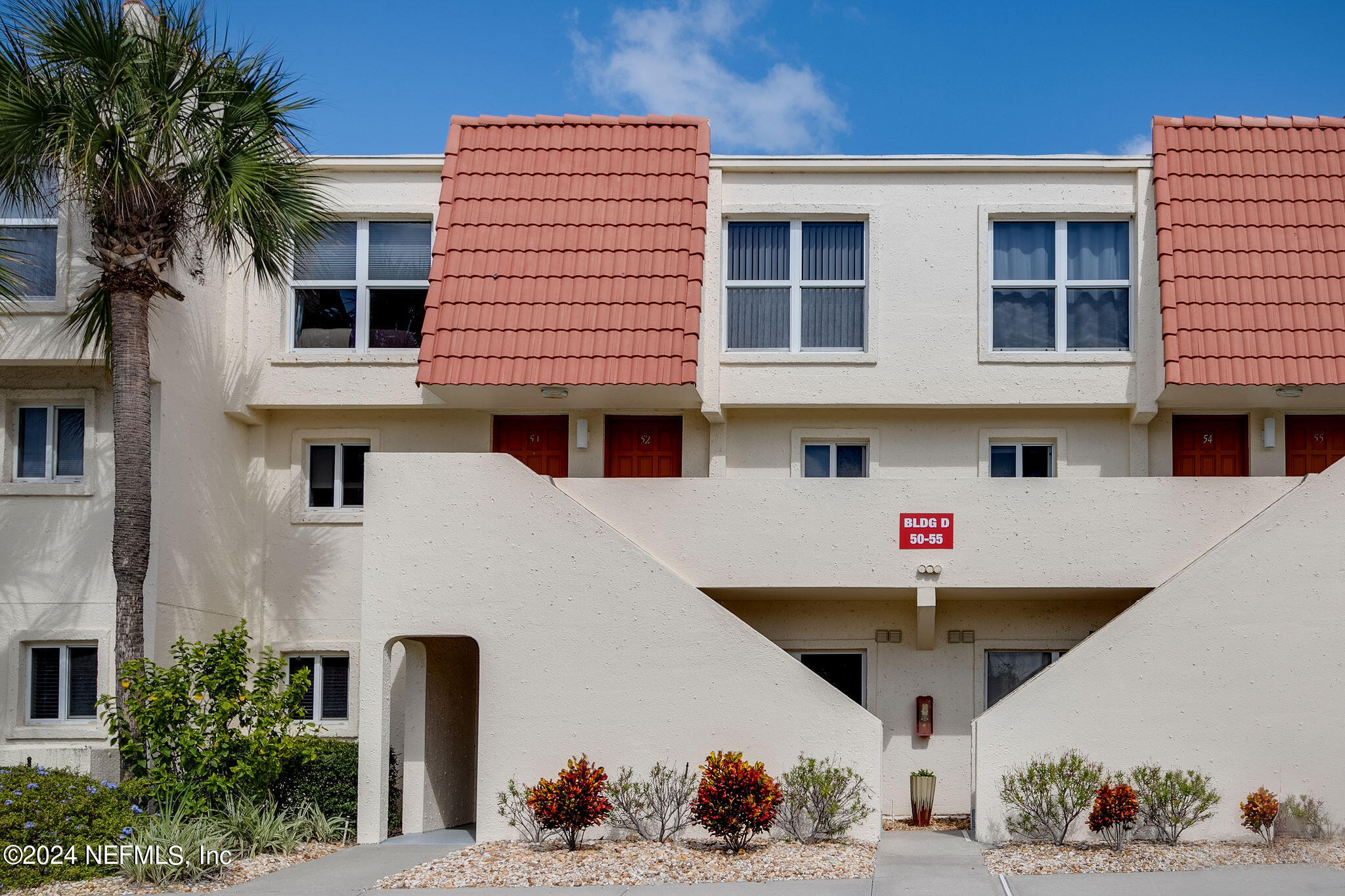 390 A1A Beach Boulevard, Unit 50 St. Augustine, FL 32080 - Photo 2 of 20 a front view of a building with outdoor space