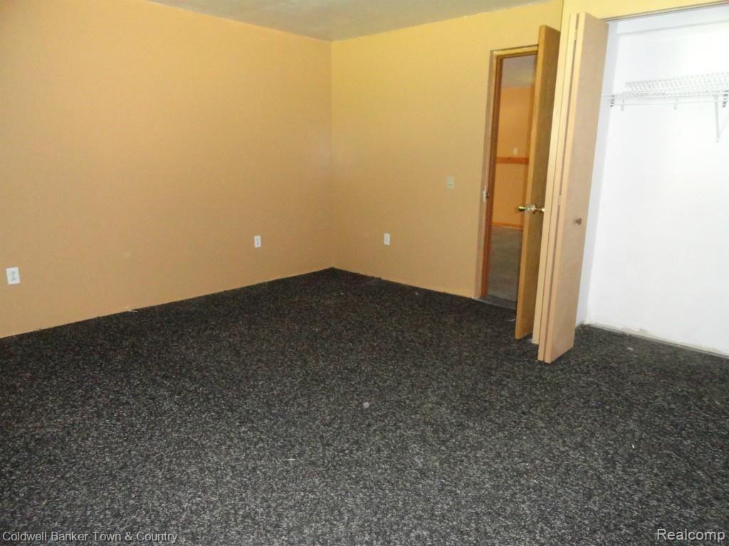 4500 Hogback Road Fowlerville, MI 48836 - Photo 34 of 48 Basement Bedroom.jpg