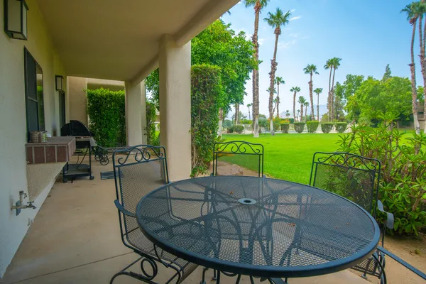 an outdoor space with furniture