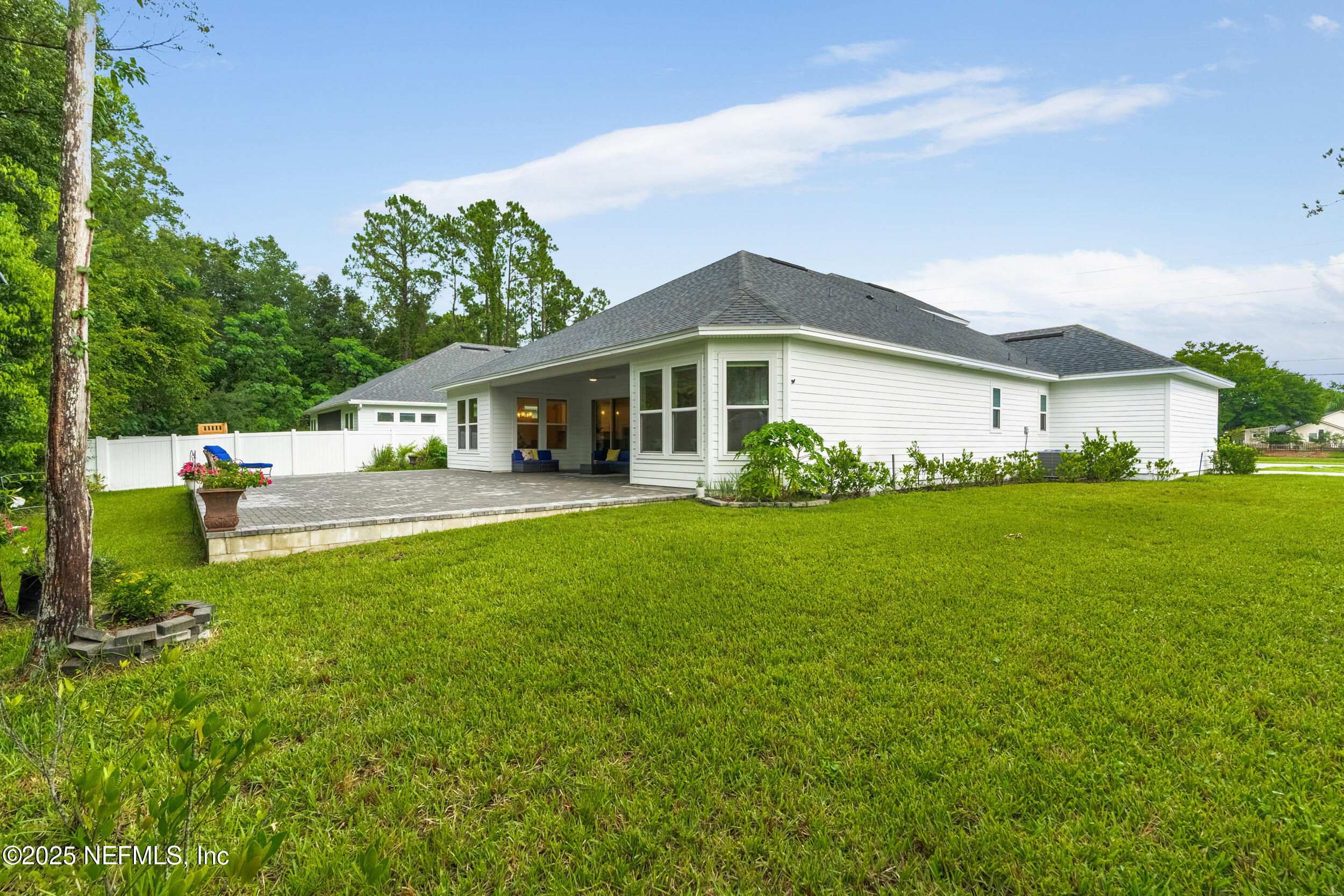 2867 Orange Picker Road Jacksonville, FL 32223 - Photo 44 of 59 a front view of a house with garden