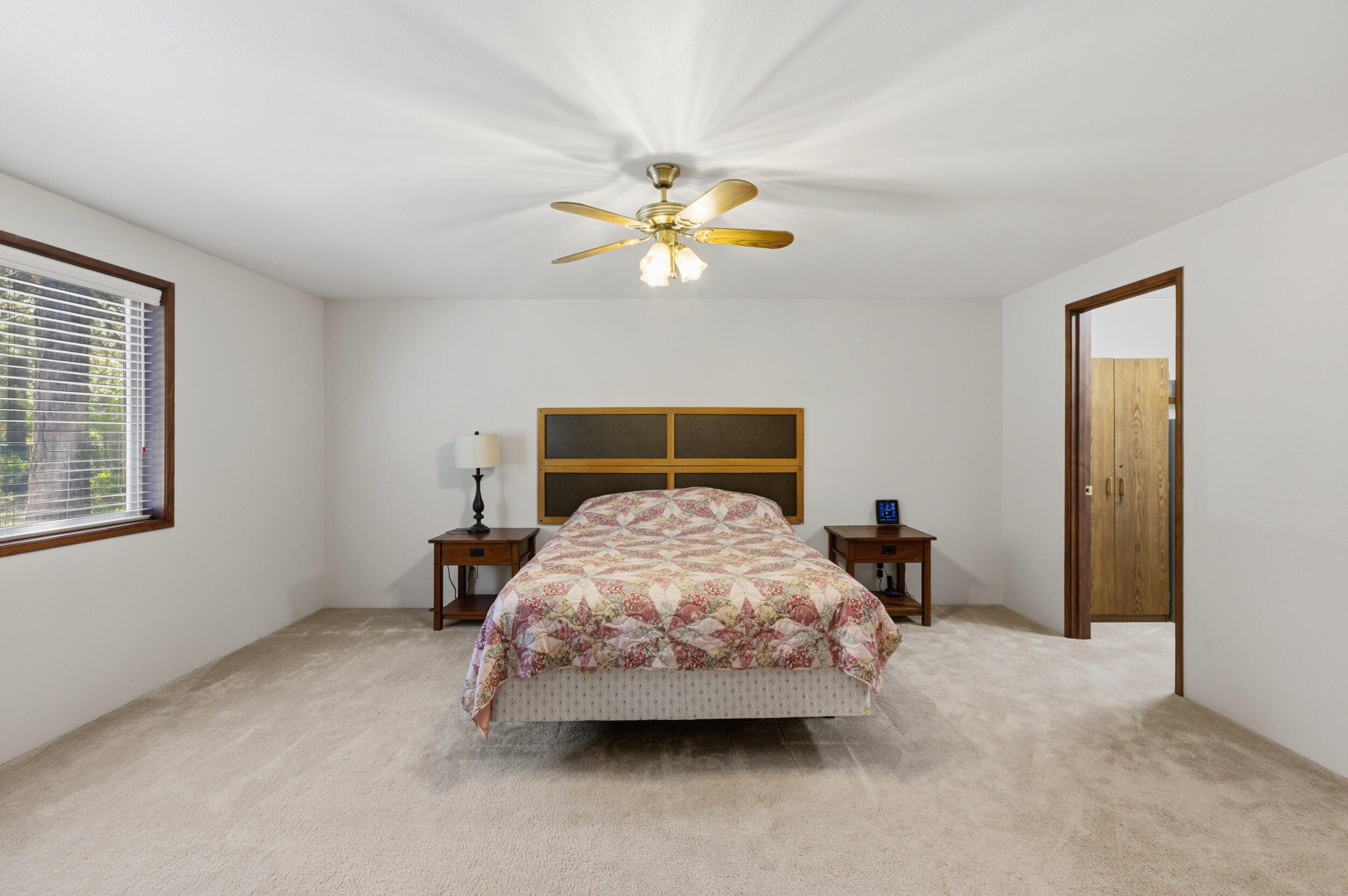 50868 Doe Loop La Pine, OR 97739 - Photo 27 of 51 a bedroom with a bed and a ceiling fan