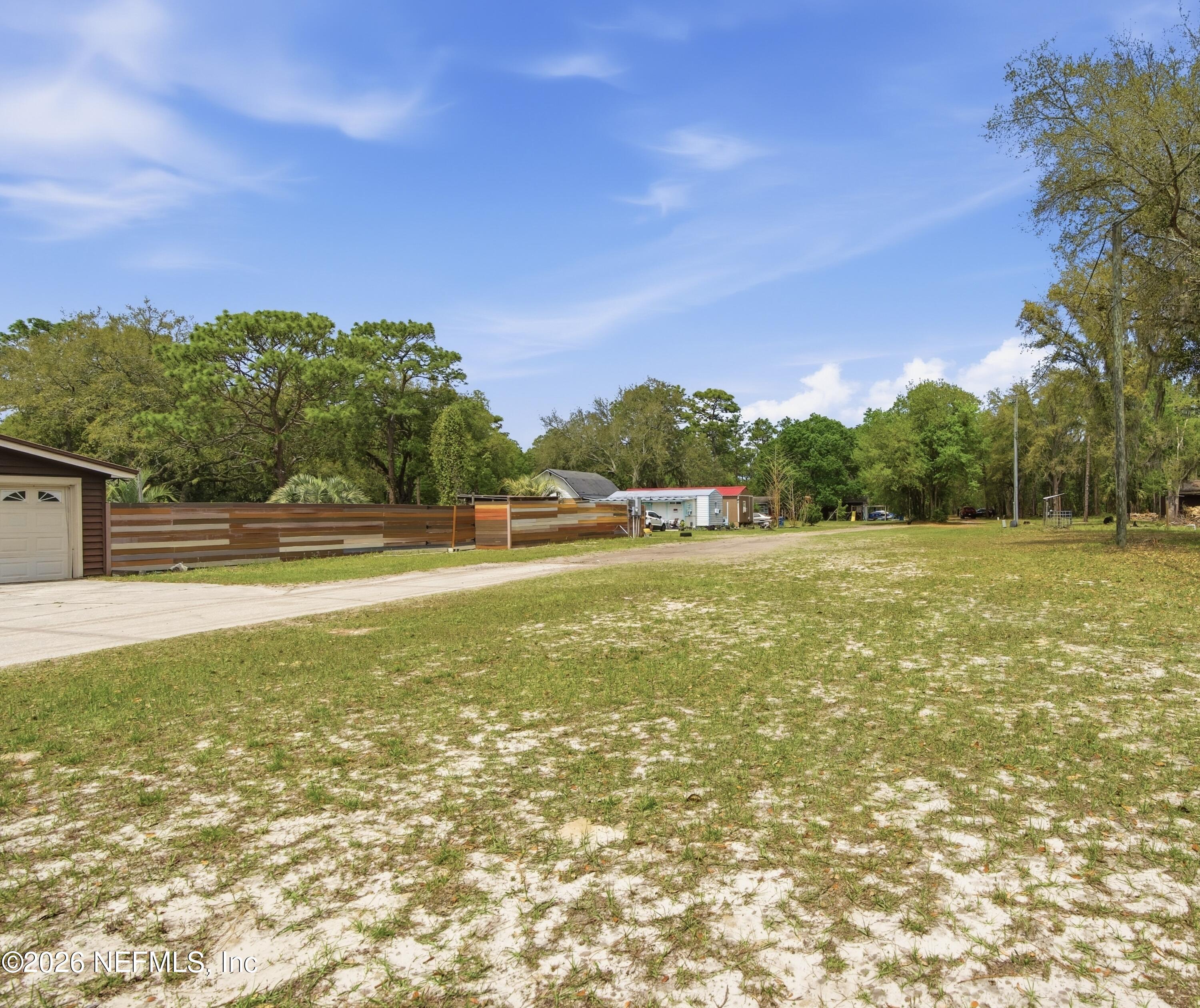4111 Cedar Point Road Jacksonville, FL 32226 - Photo 11 of 14 a view of a green field