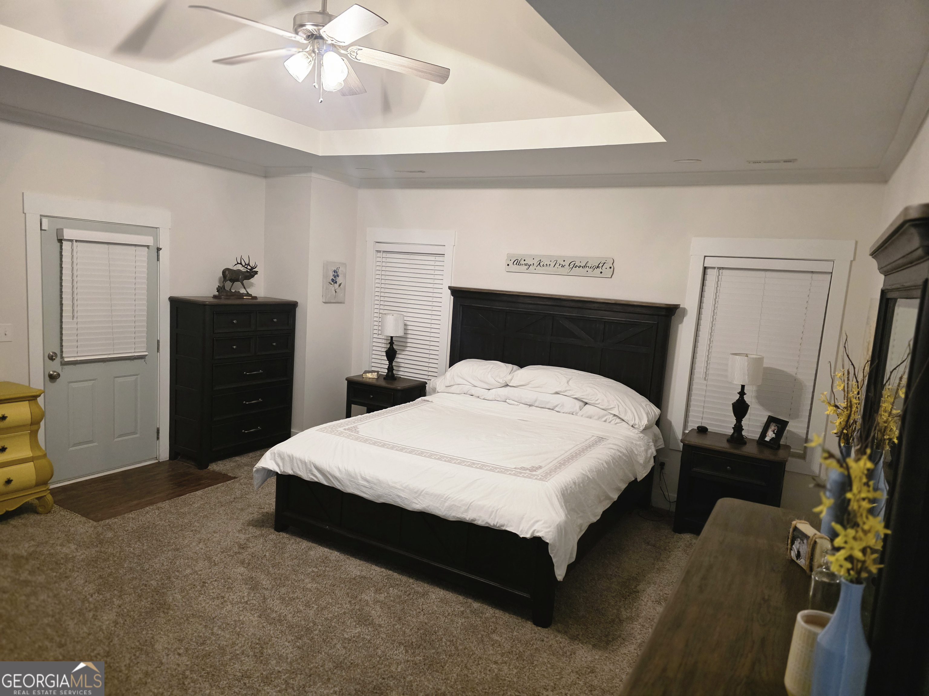 3060 Eatonton Road Madison, GA 30650 - Photo 22 of 65 a bedroom with a bed and a dresser