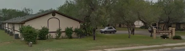 a house view with a garden space