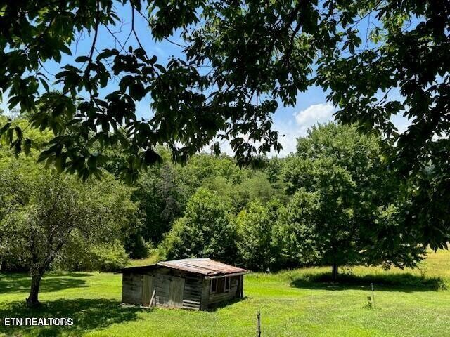 239 Miller Road Pikeville, TN 37367 - Photo 6 of 29 a garden view with a seating space