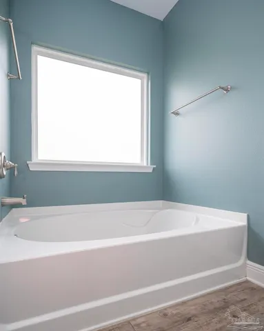 a bathroom with bathtub