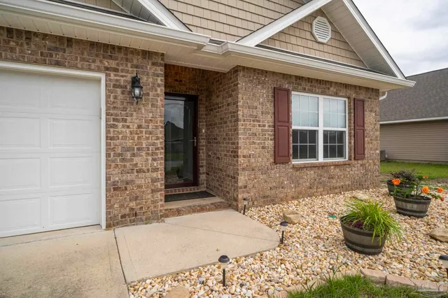 a front view of a house with patio
