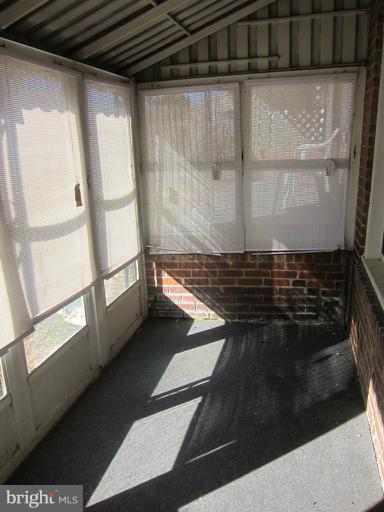 461 Roundview Road Baltimore, MD 21225 - Photo 9 of 11 Enclosed Patio