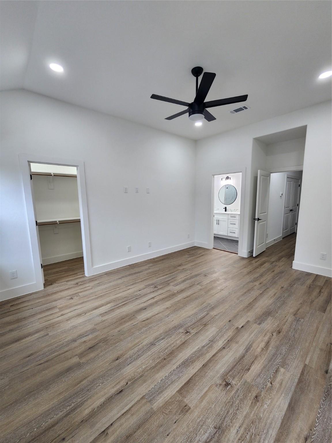 650 Everett Street, Unit B Conroe, TX 77301 - Photo 14 of 20 a view of empty room with wooden floor