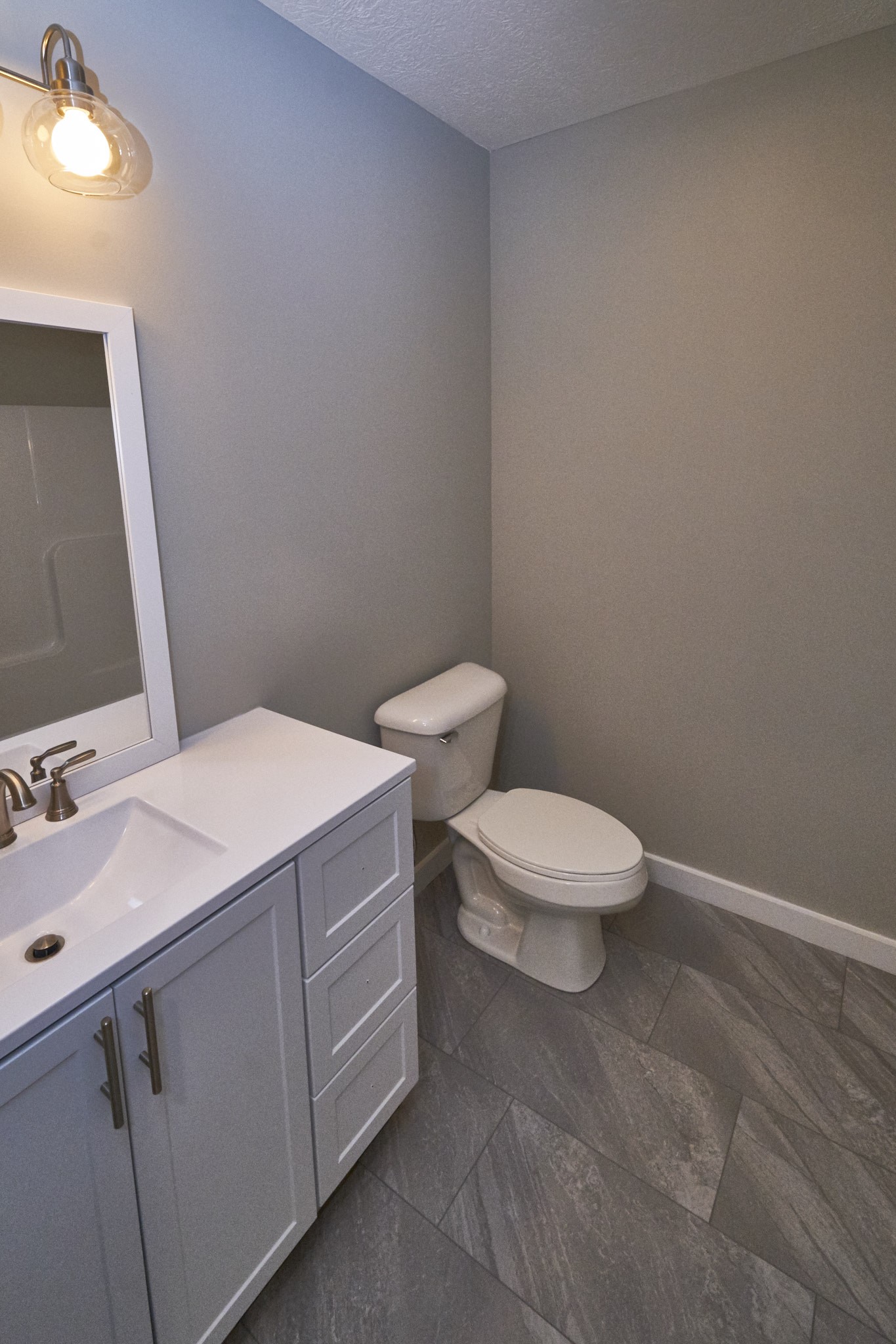5320 Golden Eagle Lane Corryton, TN 37721 - Photo 17 of 27 a bathroom with a toilet sink and mirror