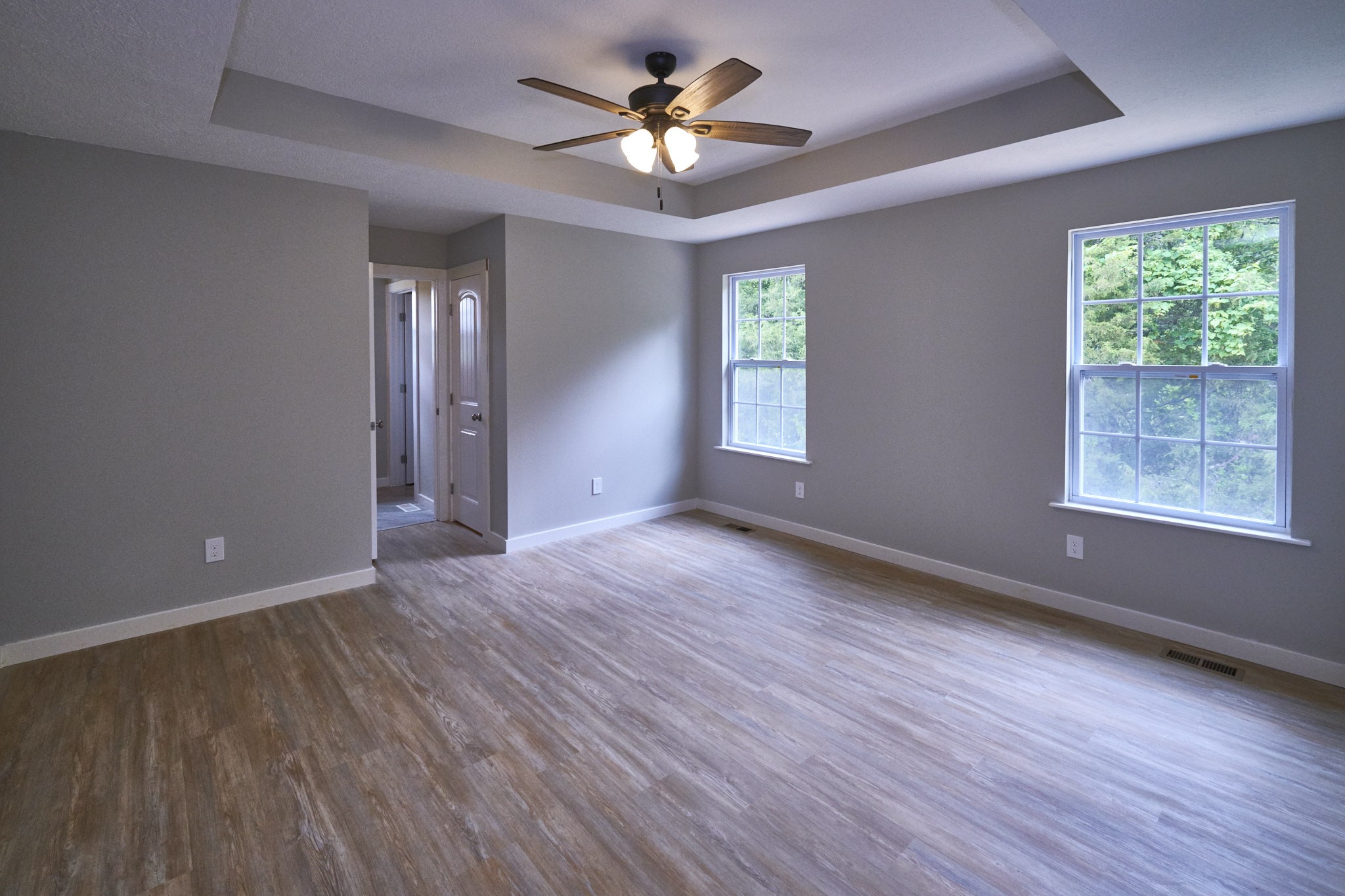 5320 Golden Eagle Lane Corryton, TN 37721 - Photo 10 of 27 a view of room with window ceiling fan and hardwood floor