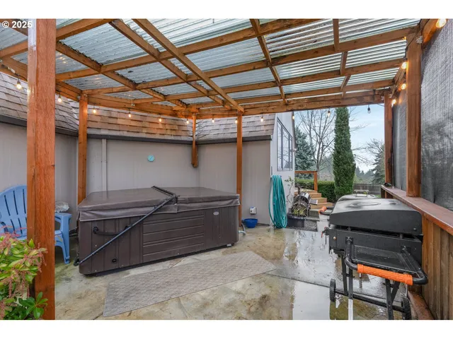a room with furniture and a flat screen tv