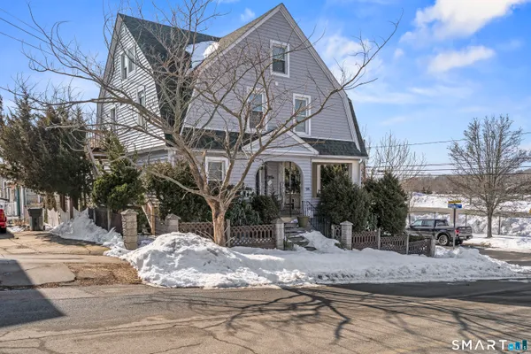a view of a house with a snow