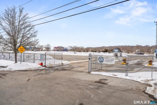 a view of a road with a yard