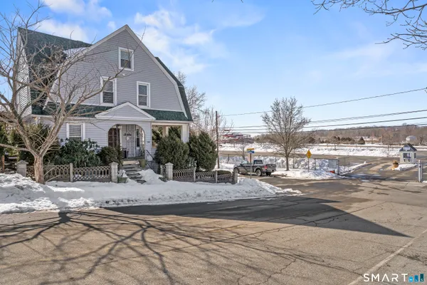 a view of a street with houses