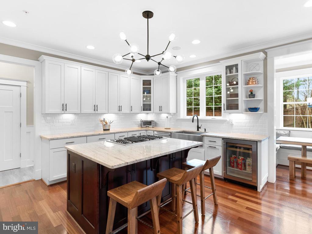 2107 Ellis Street Silver Spring, MD 20910 - Photo 15 of 65 Large island with Sputnik light fixture