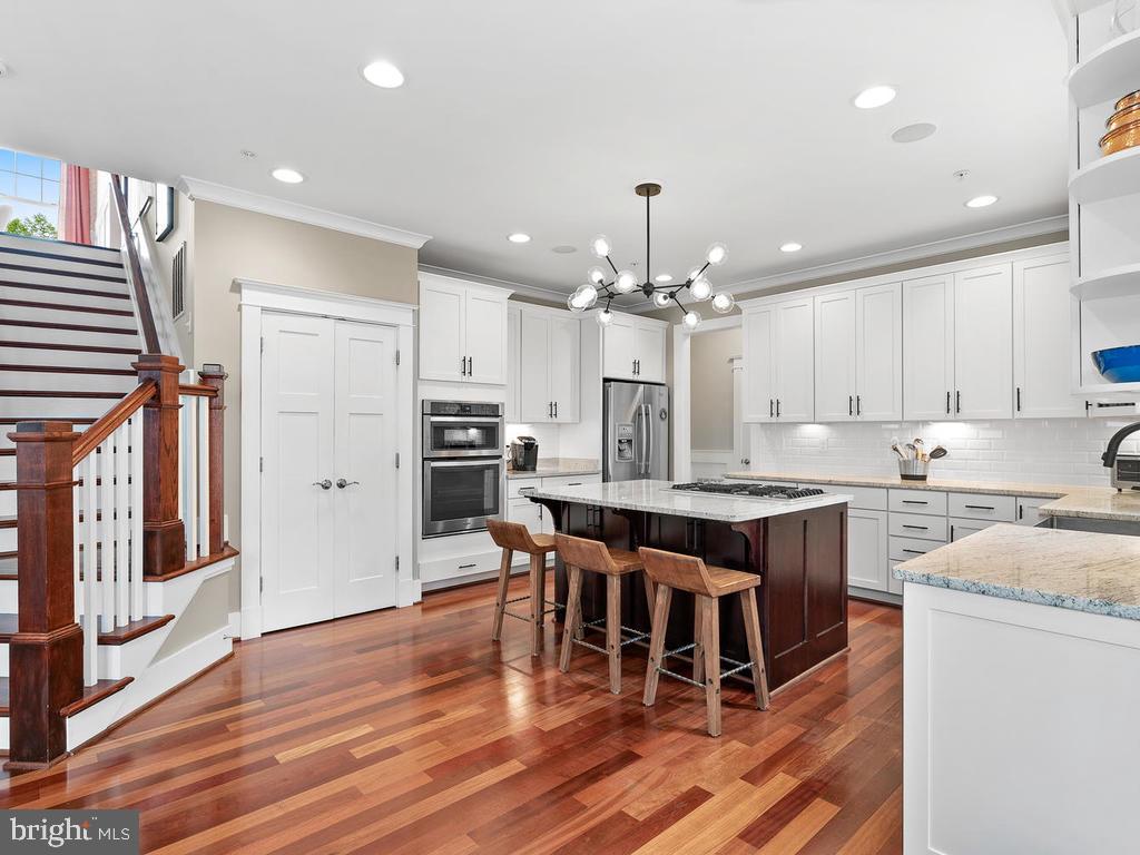 2107 Ellis Street Silver Spring, MD 20910 - Photo 18 of 65 Grand staircase overlooks gourmet kitchen