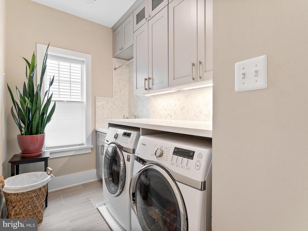 2107 Ellis Street Silver Spring, MD 20910 - Photo 29 of 65 Laundry room with stone countertop