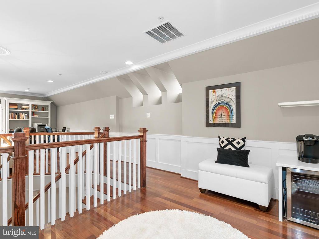 2107 Ellis Street Silver Spring, MD 20910 - Photo 40 of 65 Third level loft foyer with fridge, coffee station