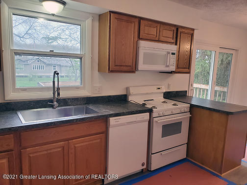 5594 Marsh Road Haslett, MI 48840 - Photo 3 of 24 20210506_164837