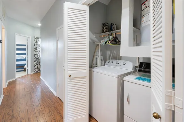 a utility room with dryer and washer