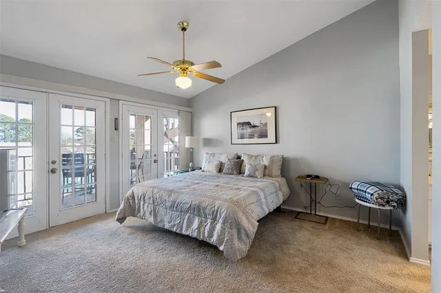 a bedroom with a bed dresser and a window