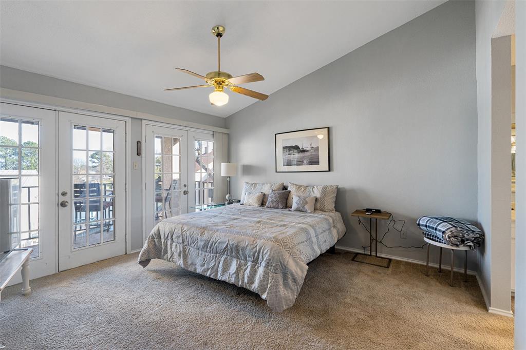 1933 Island Circle, Unit B209 Tool, TX 75143 - Photo 22 of 30 a bedroom with a bed dresser and a window