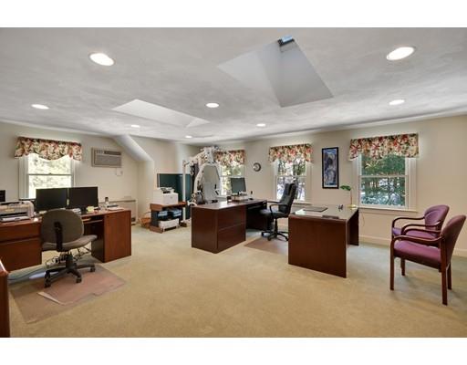 54 Pinecroft Road Weston, MA 02493 - Photo 23 of 30 a living room with furniture a window and a flat screen tv
