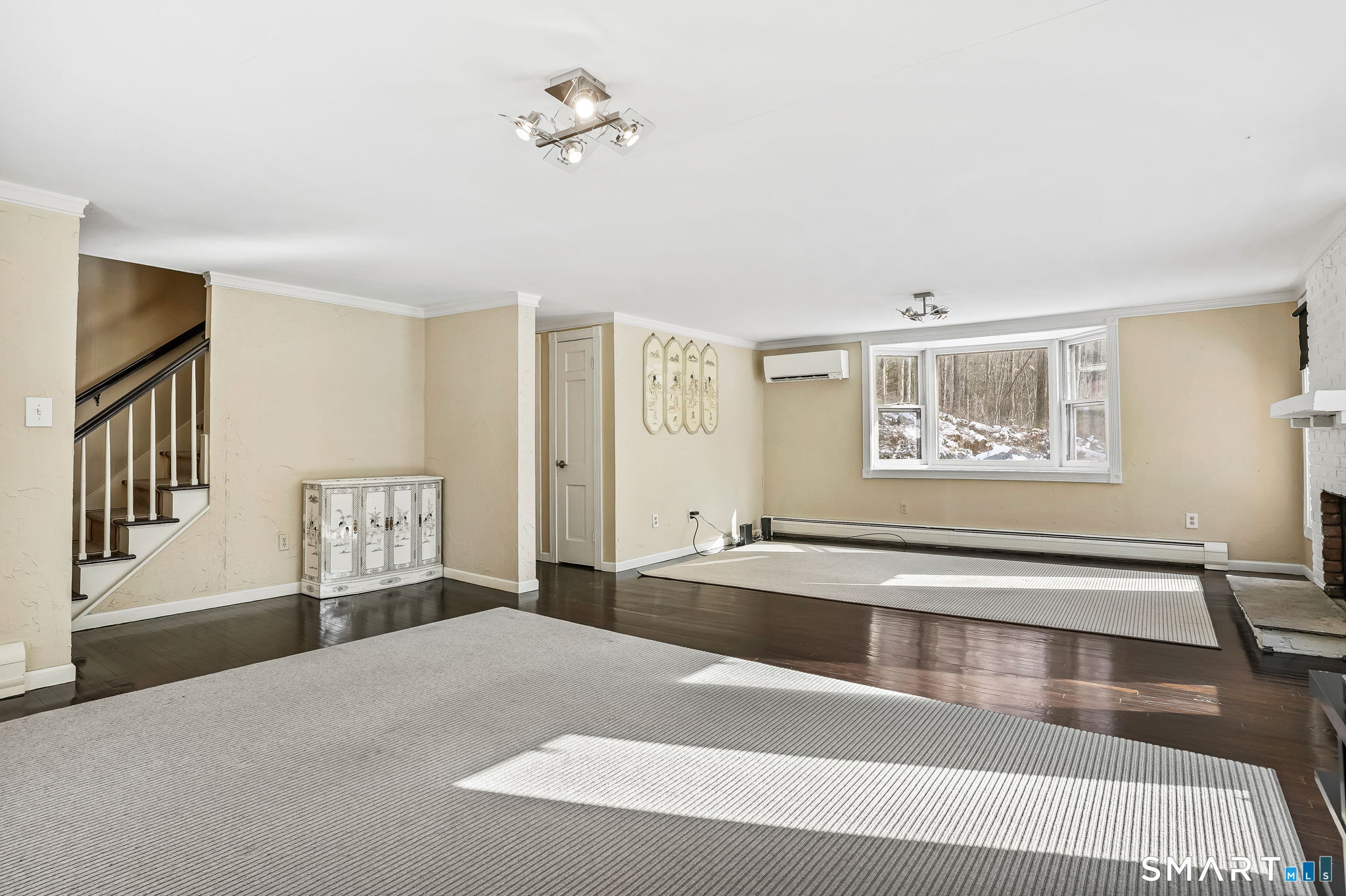 12 Skidmore Lane Sandy Hook, CT 06482 - Photo 3 of 27 a living room with furniture and a window