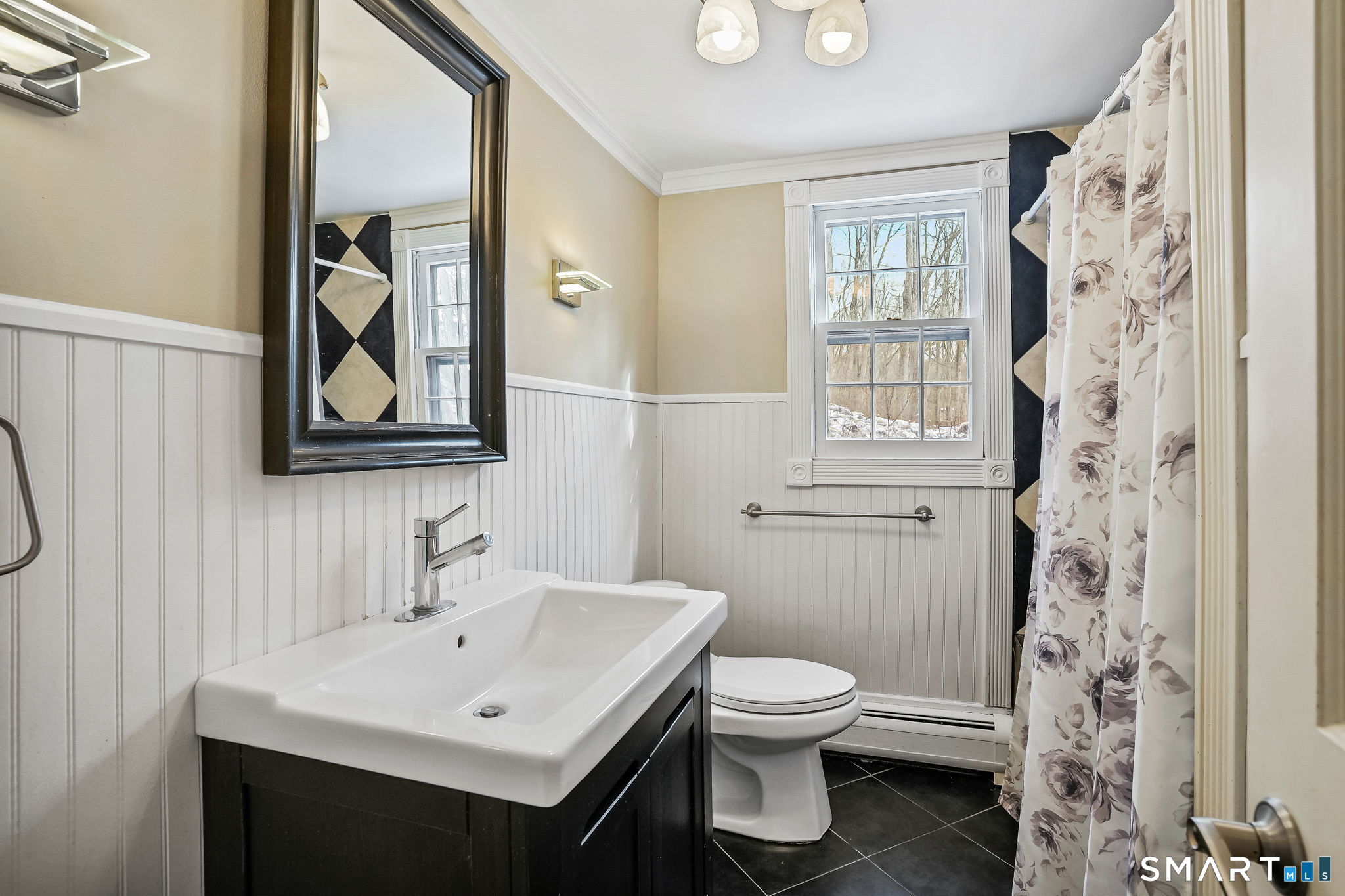 12 Skidmore Lane Sandy Hook, CT 06482 - Photo 6 of 27 a bathroom with a toilet sink and mirror