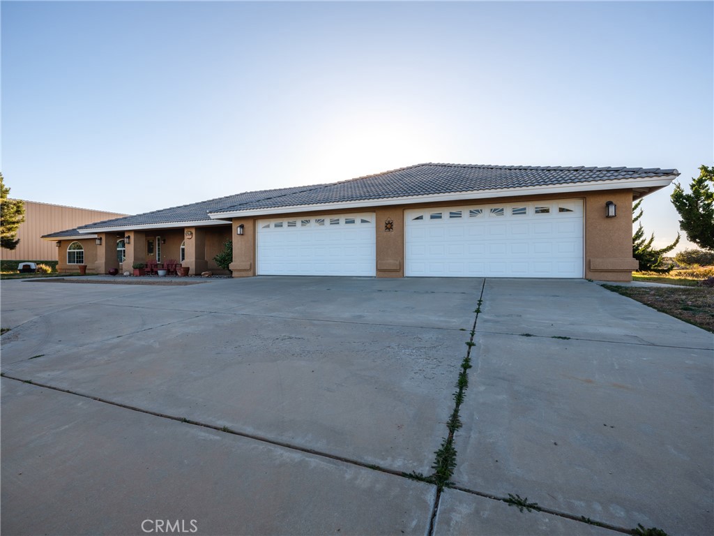 7448 Shasta Road Phelan, CA 92371 - Photo 1 of 1 a view of a car garage