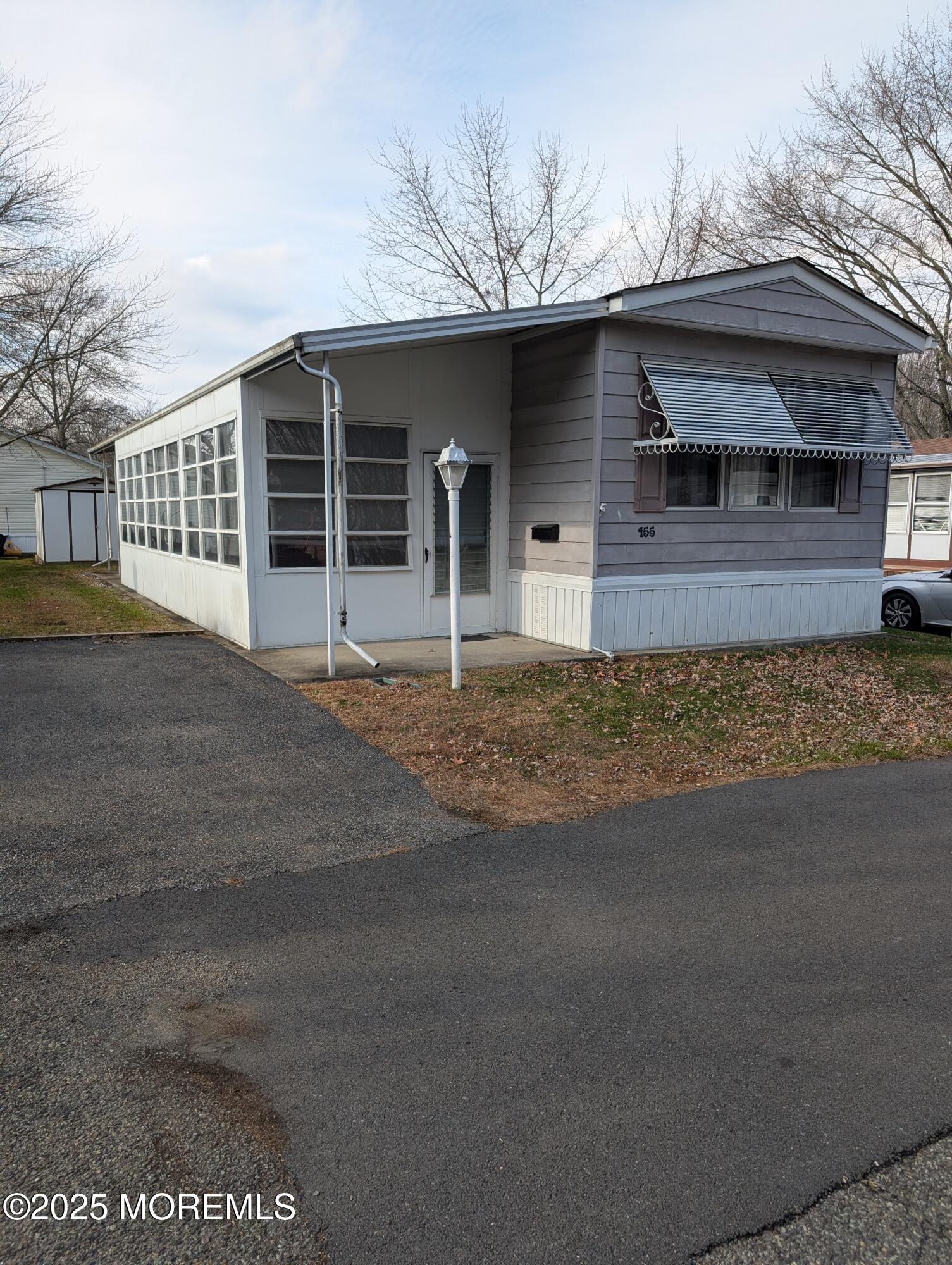 a front view of a house with garage