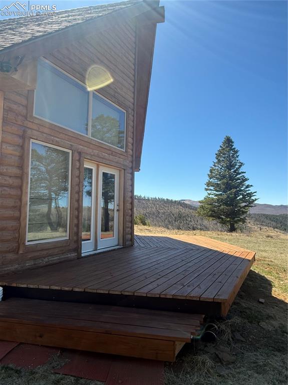 450 Schierl Road Fort Garland, CO 81133 - Photo 9 of 40 a view of backyard with deck and outdoor seating