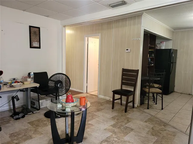 a view of a workspace with furniture