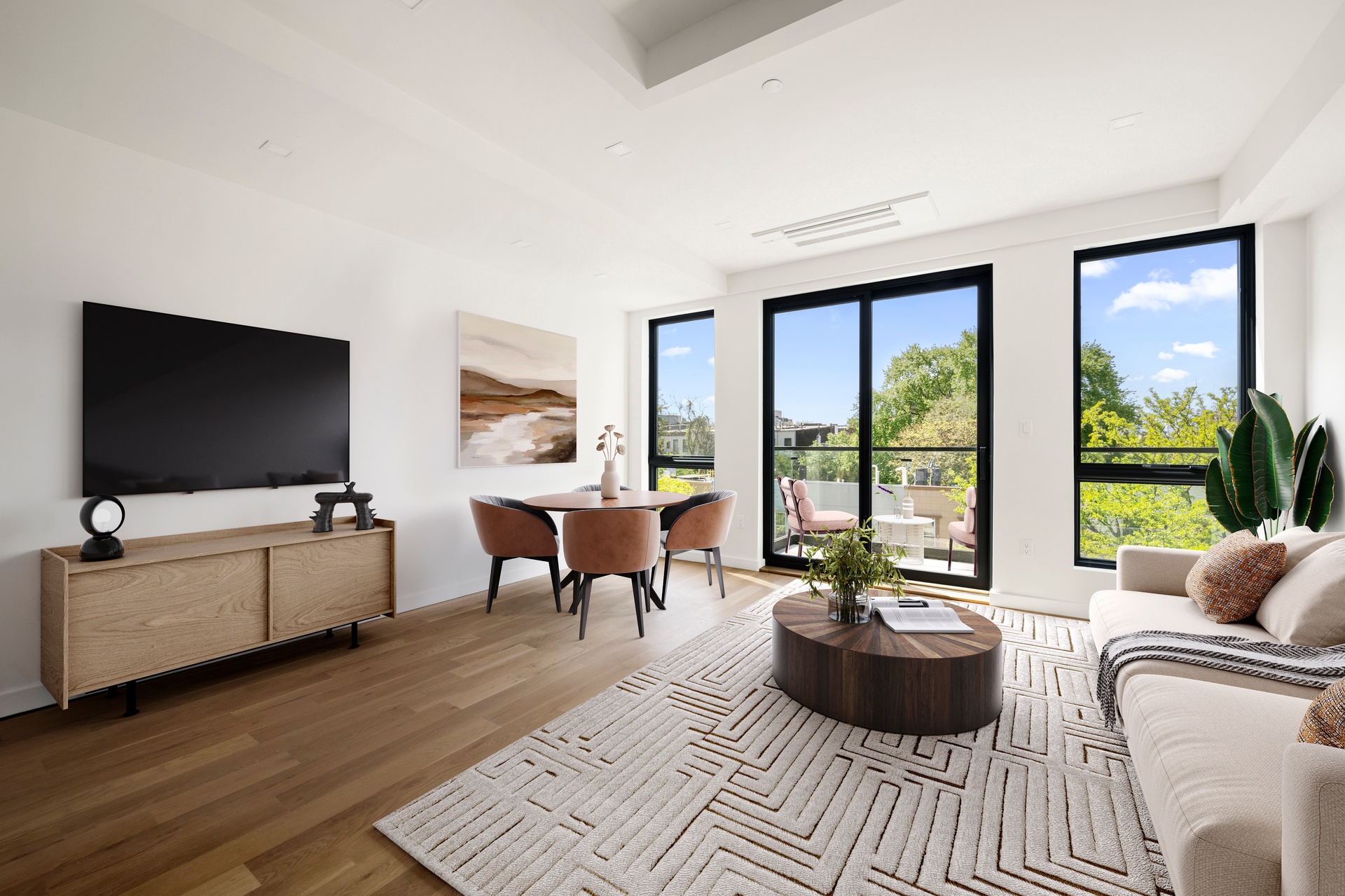 78 Harman Street, Unit 4F Brooklyn, NY 11221 - Photo 1 of 9 a living room with furniture and a flat screen tv