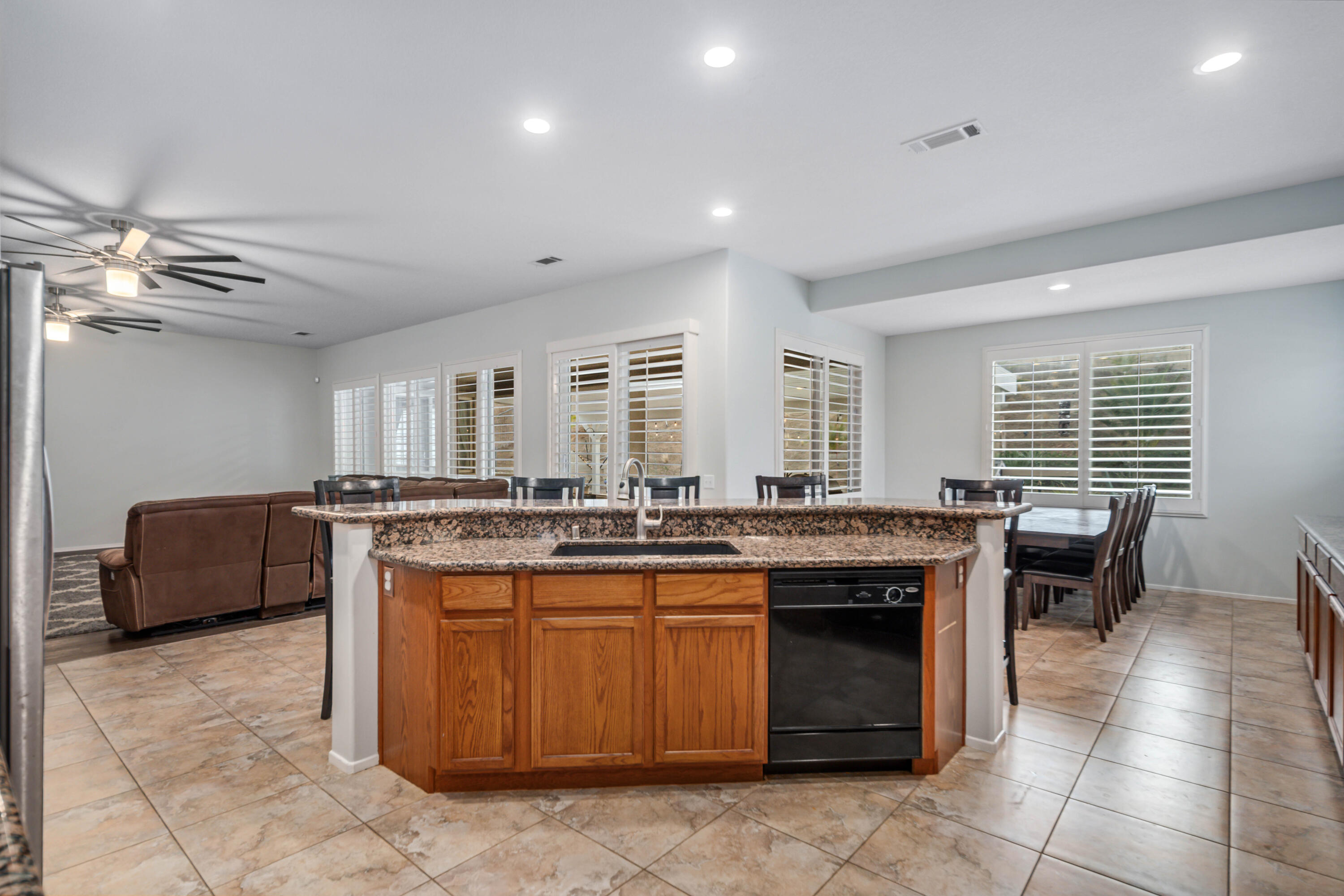 40467 Tiger Way Palmdale, CA 93551 - Photo 14 of 60 a kitchen with a counter top space appliances and cabinets