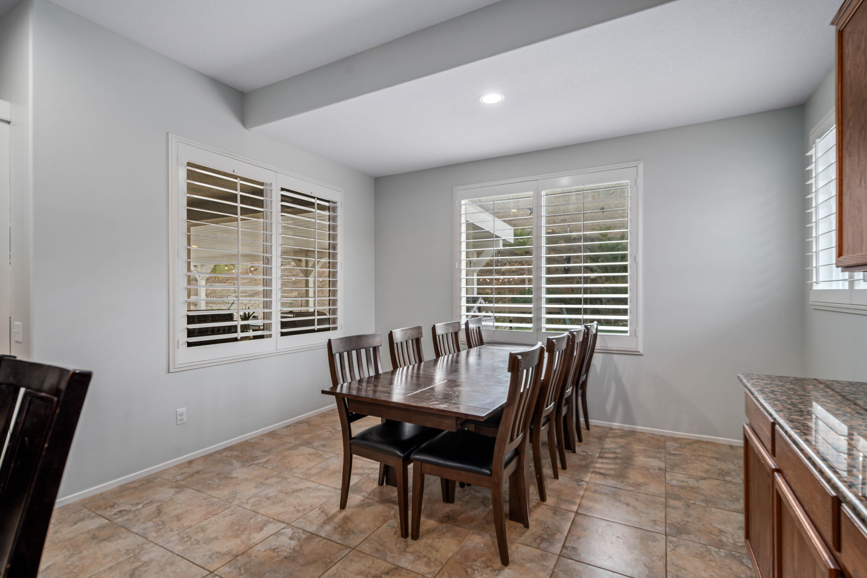 40467 Tiger Way Palmdale, CA 93551 - Photo 15 of 60 a view of a dining room with furniture window and outside view