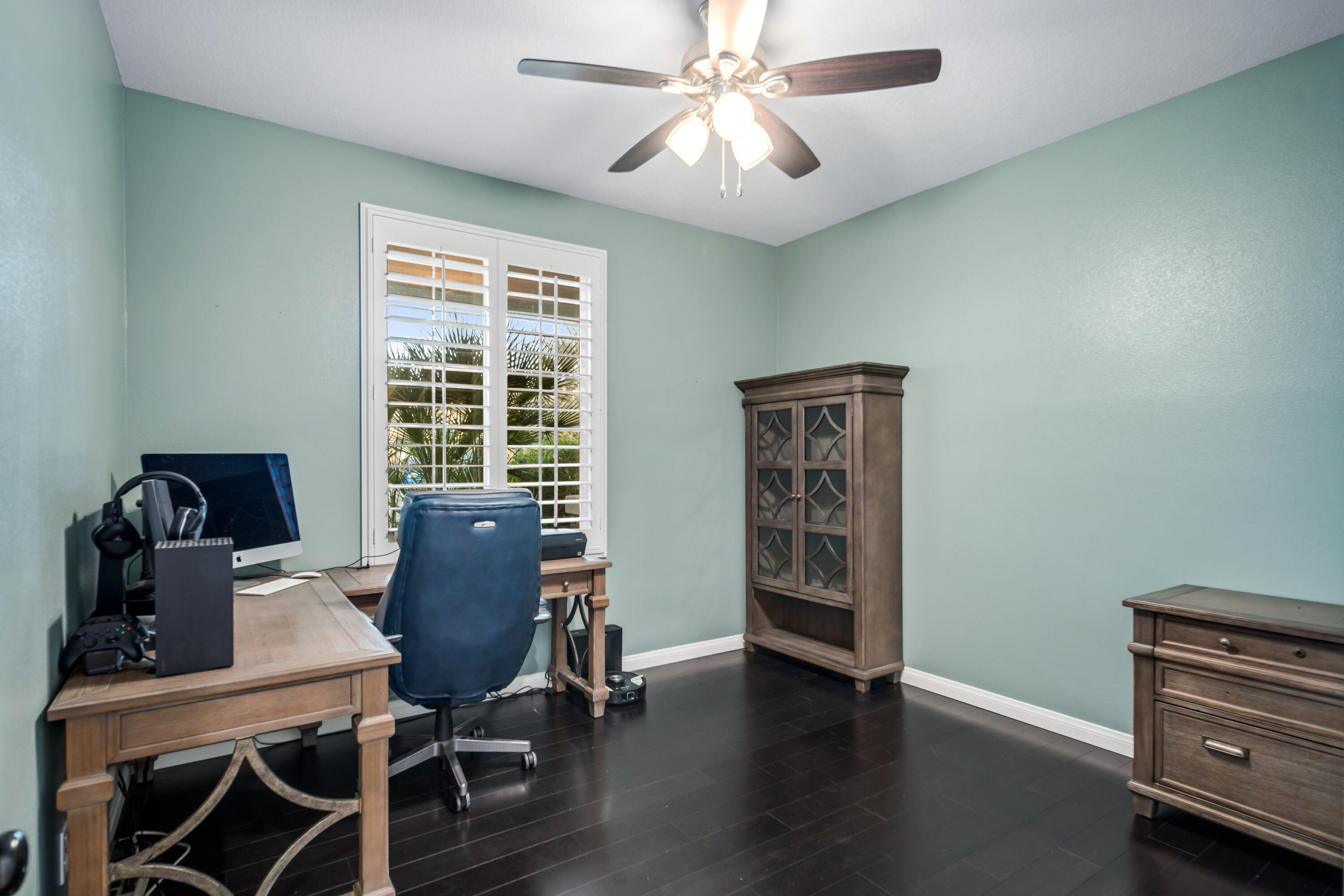 40467 Tiger Way Palmdale, CA 93551 - Photo 31 of 60 a view of a workspace with furniture and a window