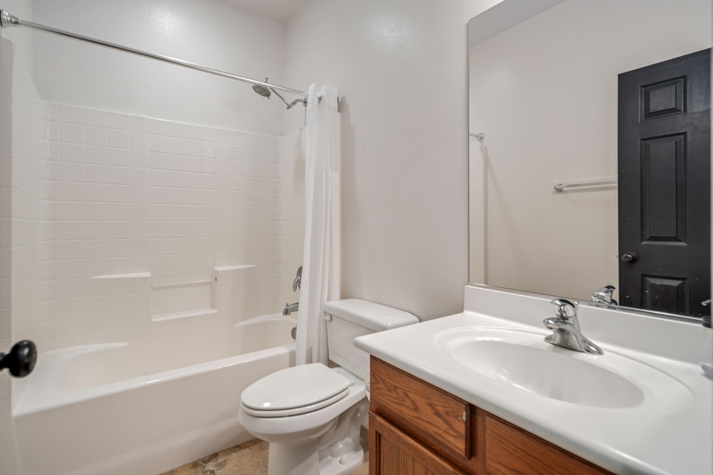 40467 Tiger Way Palmdale, CA 93551 - Photo 32 of 60 a bathroom with a sink toilet and shower