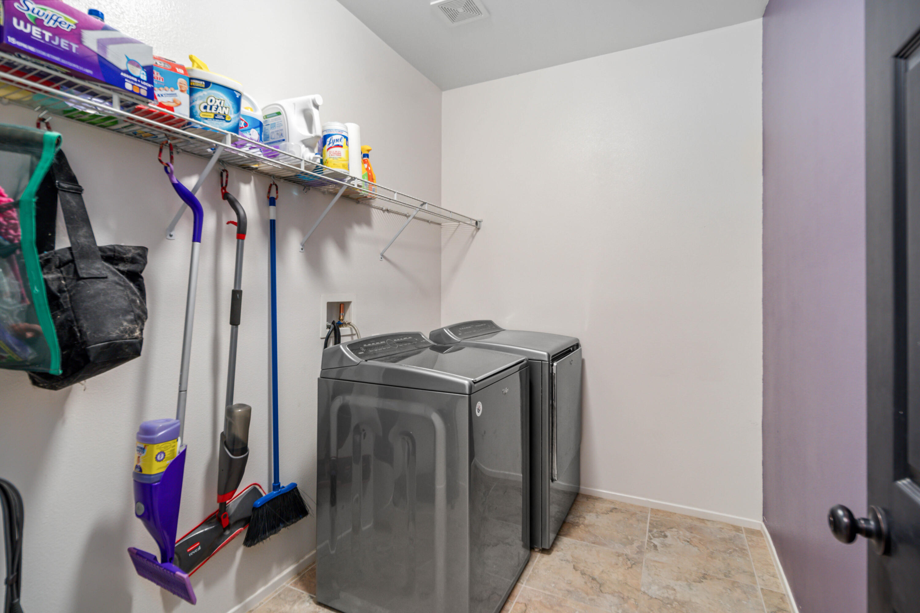 40467 Tiger Way Palmdale, CA 93551 - Photo 33 of 60 a view of walk in closet with clothes and shoes