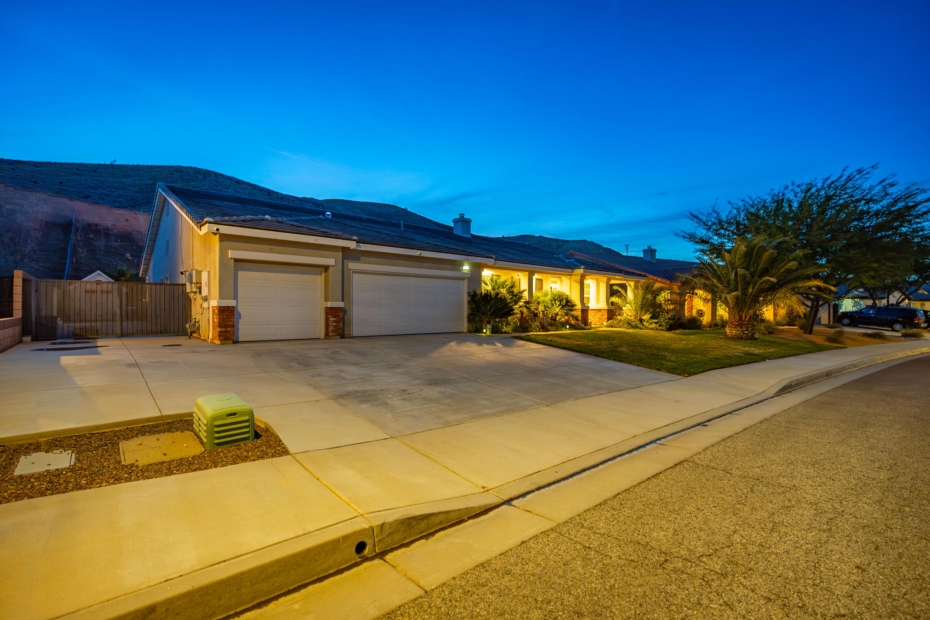 40467 Tiger Way Palmdale, CA 93551 - Photo 5 of 60 a view of a house with a street