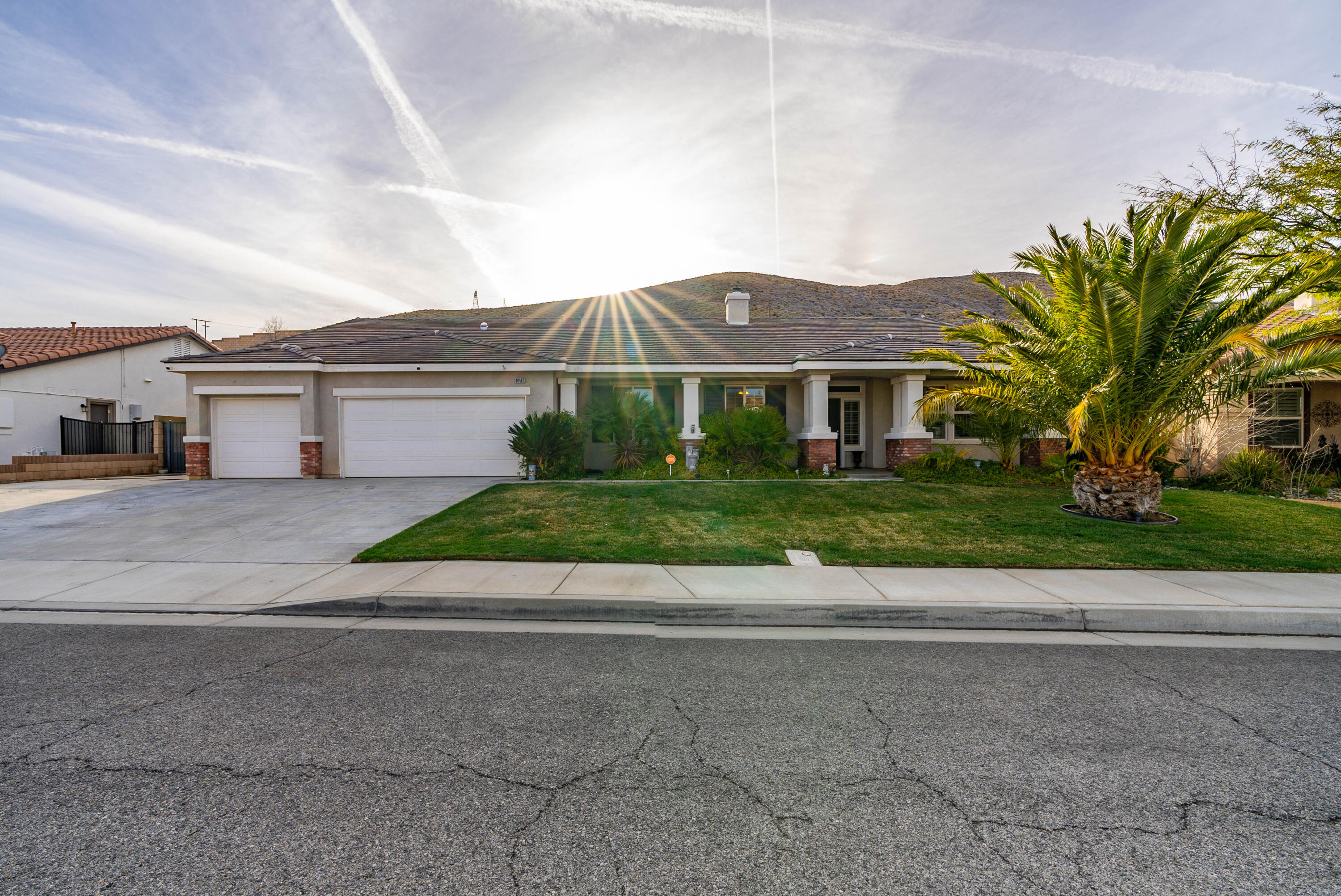 40467 Tiger Way Palmdale, CA 93551 - Photo 58 of 60 a front view of house with yard and green space