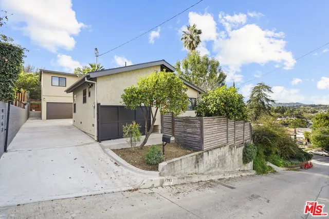 a view of a house with a patio