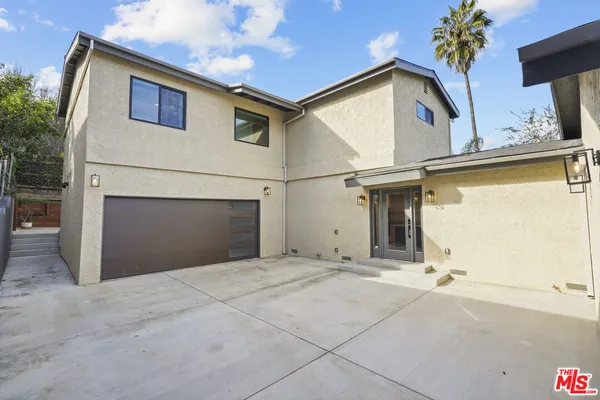 a view of a house with a garage