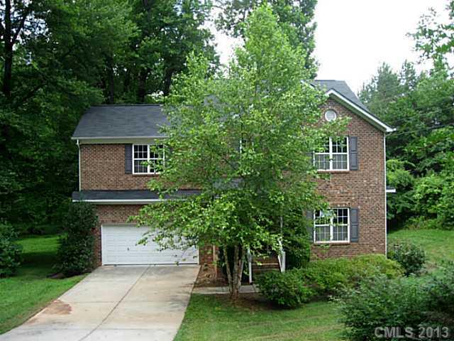 5727 Charing Place Charlotte, NC 28211 - Photo 1 of 15 a front view of a house with a yard